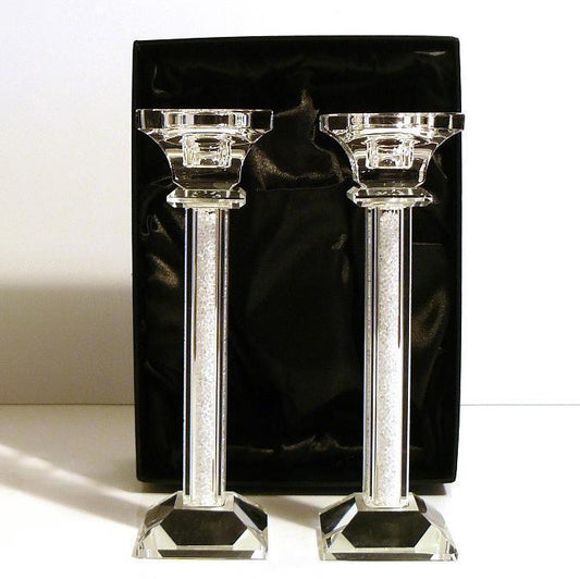 Glass candlesticks filled with crystals